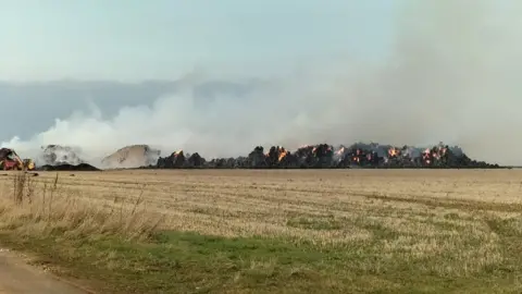 Bales on fire