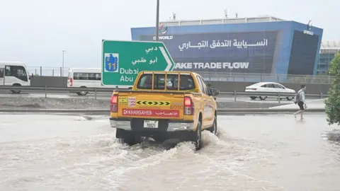 Getty Images Vehicles hardly move on flooded streets due to heavy rain in Dubai, United Arab Emirates on April 16, 2024. The torrential rain in Dubai, United Arab Emirates (UAE), had a detrimental effect on daily life.