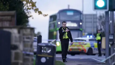 PA Media Police close road after boy stabbed in Horsforth