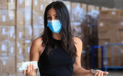 EPA Deputy Mayor of Madrid Begona Villacis wears a face mask as she talks to journalists