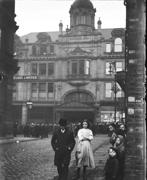 Bradford Museums & Galleries People leaving service at Eastbrook Hall on the corner of Brooklyn Street and George Street. c1910
