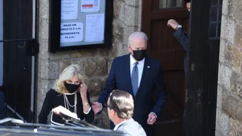 Getty Images US President Joe Biden and First Lady Jill Biden at the Sacred Heart and St Ia Catholic Church in St Ives