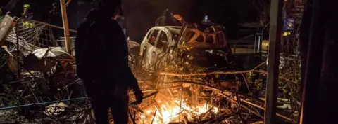 AFP A protester looks at destruction at the Chinese University of Hong Kong