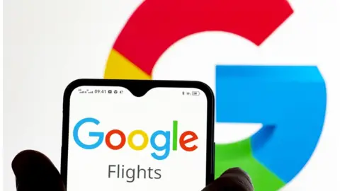 Igor Golovniov/SOPA Images/Getty Images Person holds a phone with the Google flights app above the google sign