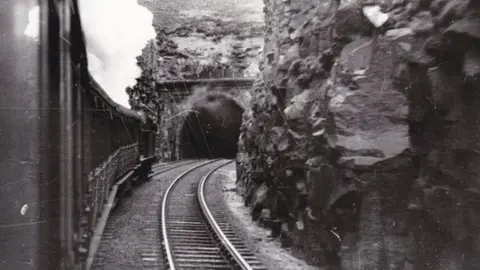 H C Casserley Steam train enters Queensbury Tunnel