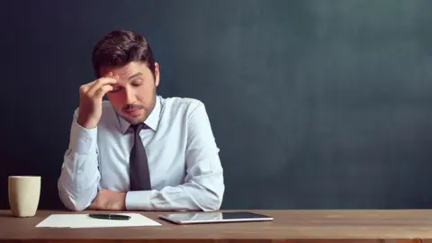 pinstock/Getty Images Teacher stressed (actor)