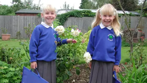 Family photo Sam left, Chris right