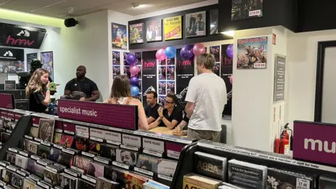 Lauren Carter/BBC Fans meeting McFly in HMV in Chelmsford