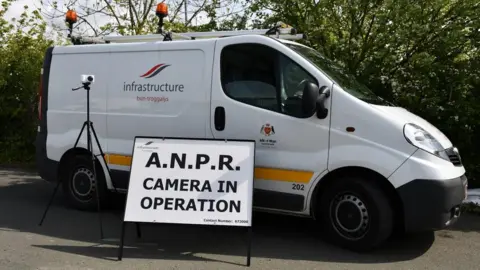 DOI Infrastructure department van with ANPR camera and sign