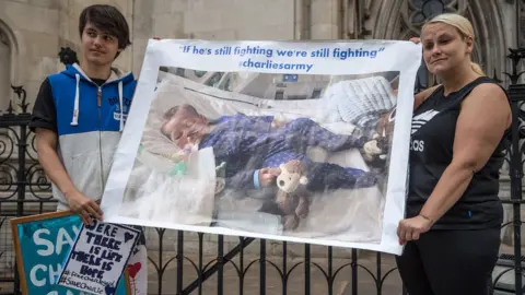 Getty Images Royal Court of Justice poster protest