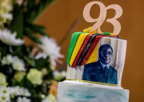 AFP A picture taken on February 21, 2017 shows a cake bearing a portrait of Zimbabwe's President Robert Mugabe during a private ceremony to celebrate Mugabe's 93rd birthday in Harare.