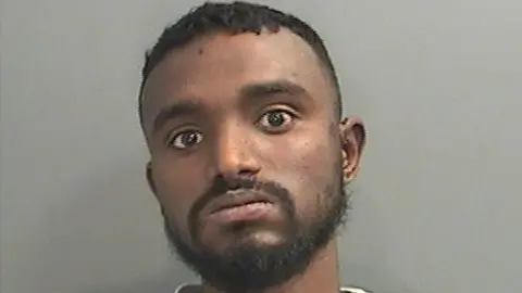 South Wales Police Abdirahaman Hashi