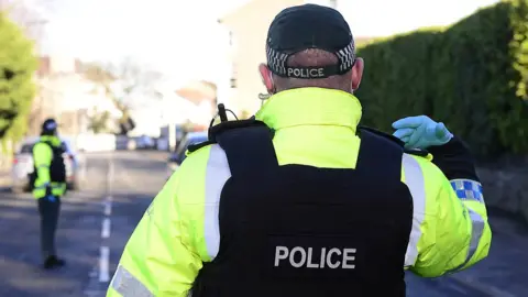 Pacemaker A police officer directs traffic