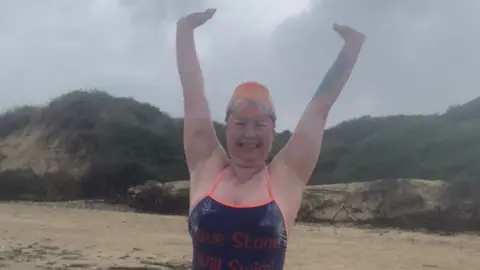 Nicola Napier Gill Castle after completing the swim