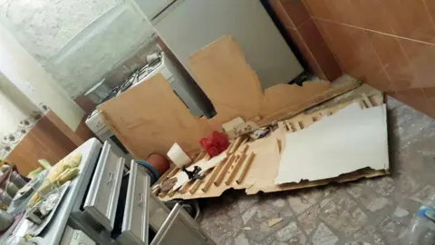 Om Mudar Om Mudar's bombed kitchen