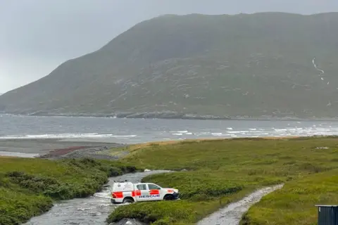 Skye Mountain Rescue Team A Skye Mountain Rescue Team drives through a steam during a call out on Friday