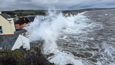 Gull Perch Waves are seen hitting the shore in Torcross.