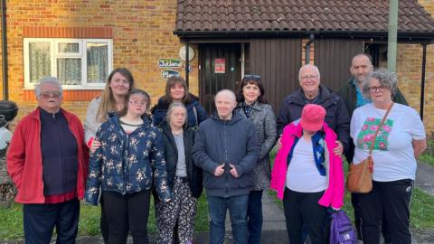 Residents of Jutland Place stood outside their care home