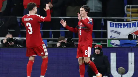 Wilson and Williams celebrate