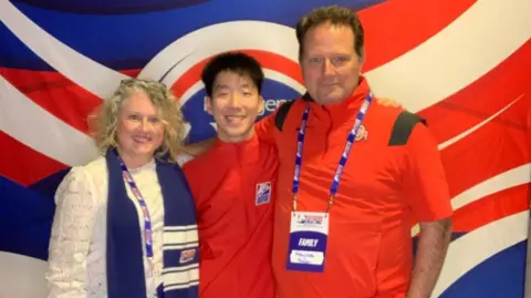 Facebook/Matthew Alan LaRaviere Stephanie Branton Haynos, Cory Haynos and Roger Haynos stand together and smile at the camera.