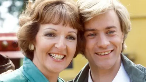 A photo of Keith and Christopher Villiers in Sweet Sixteen