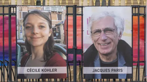 Getty Images Pictures of Cecile Kohler and Jacques Paris are tied to railings.