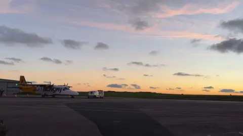 Alderney runway at sunset