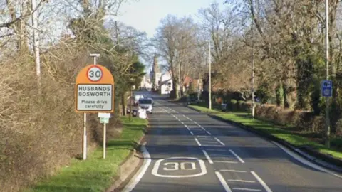 Google Sign which reads Husbands Bosworth