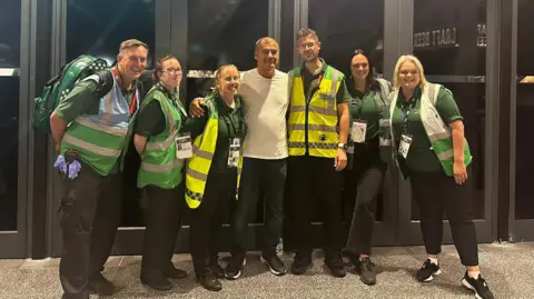 Tony Tardio pictured with the medical staff at Wembley Stadium.