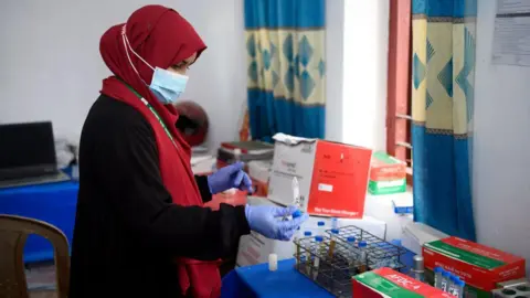  A nurse is seen working at Hossainpur Upazila Health Complex in Kishoreganj