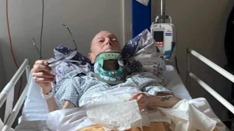 Clive Thomas in hospital