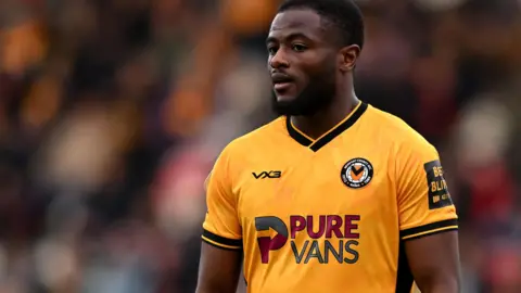 David Ajiboye in action for Newport County