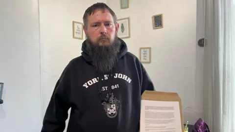 BBC/Louise Fewster Timothy Cave is holding a petition