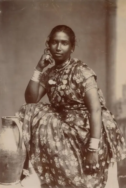 DAG An Indian woman in a sari poses for a photograph taken by Felix Morin, published in 1890.