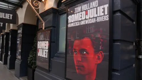 Getty Images  general view of Romeo and Juliet posters starring Tom Holland at the Duke Of York’s Theatre on May 07, 2024 in London, England