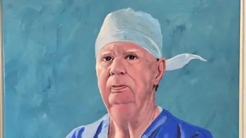 MARTIn VAUGHEN Apainting of Sean, he wears his surgeon's uniform and looks stoically out.