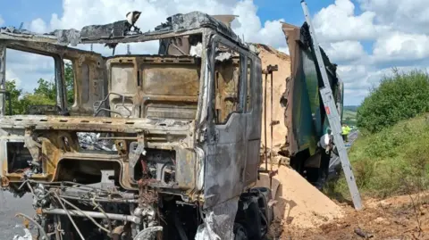 National Highways Burnt out lorry on A30