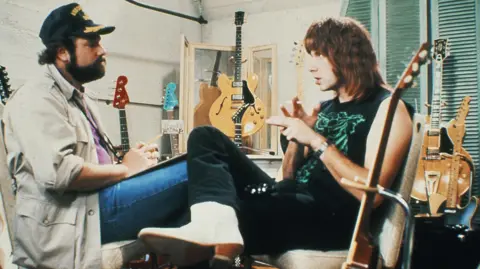 Hollywood director Rob Reiner and wife Michele found dead in LA home Authorized Spinal Tap LLC/Shutterstock Rob Reiner with Christopher Guest in This Is Spinal Tap