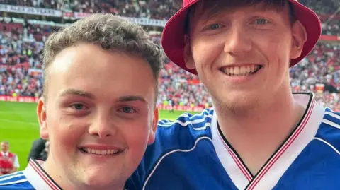 Freddy Done-Orrell Freddy and Ginge photographed in the stands of Old Trafford.