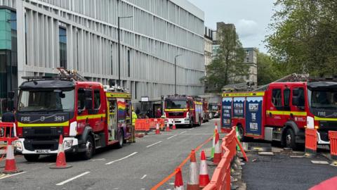 Fire engines parked on the street outside Bristol Royal Infirmary