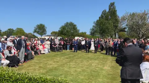 Crowds gathered at Westmount in Jersey for a memorial service on Liberation Day 2025