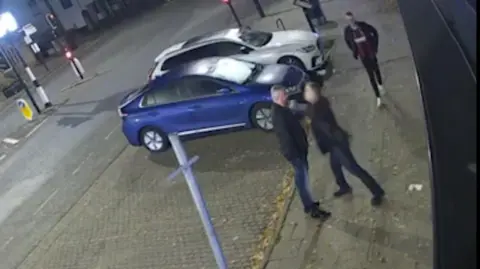 South West News Service Footage obtained by the Daily Mail purporting to show Mike Amesbury in a street altercation