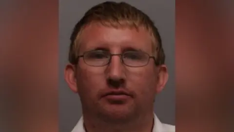 A mug shot of Michael Lawrence 