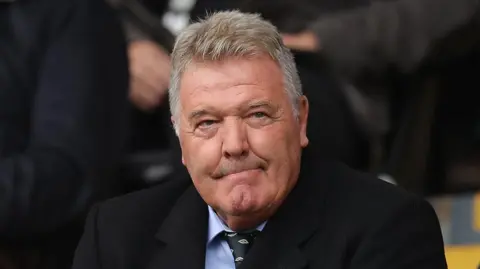 John Toshack pictured at a Swansea City match in 2017 