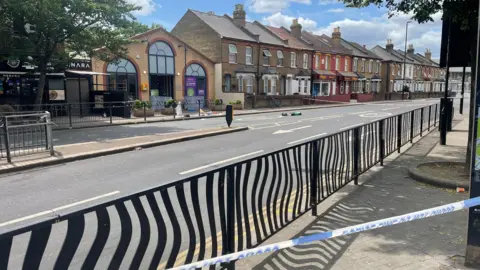 The scene in Hounslow after police were called to a stabbing on Hanworth Road