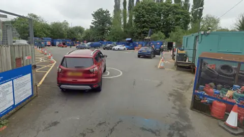 Ripon recycling centre with different recycling containers and cars dropping off recycling 