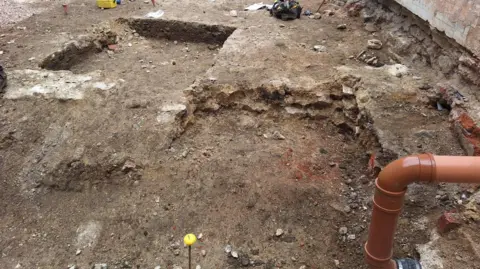 Oriel College Square sections of the ground during archaeological works.