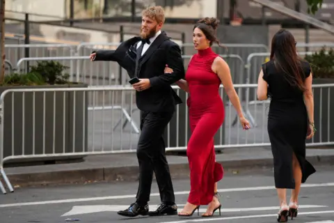 Reuters Seattle Seahawks player Cooper Kupp and his wife Anna Marie Kupp walk arm in arm as they arrive at Madison Square Garden.