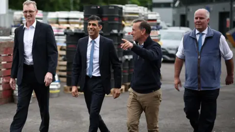 Reuters David TC Davies, Rishi Sunak, Alun Cairns and Andrew RT Davies on an early campaign visit to a south Wales brewery