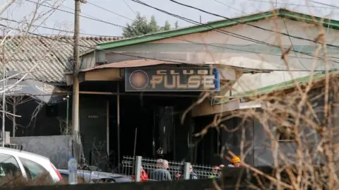 Reuters A view outside a night club, following a fire resulting in casualties, in the town of Kocani, North Macedonia, March 16, 2025